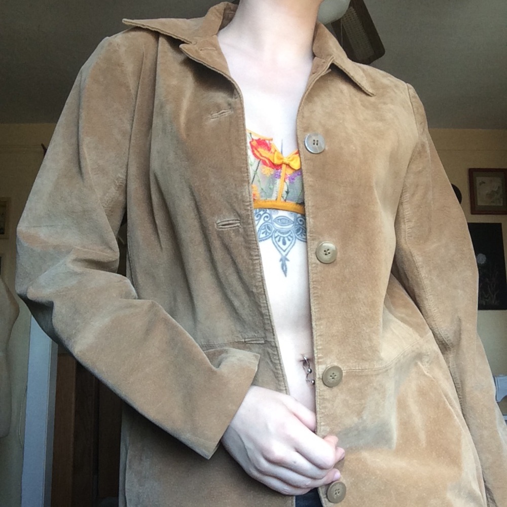 Vintage beige leather jacket.